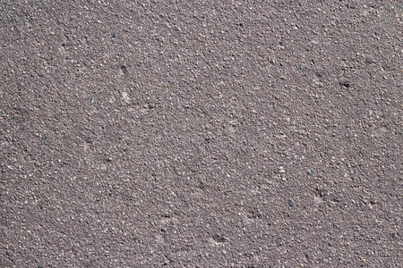 灰色公路关在上面灰色的沥青质地公路采用城市照片