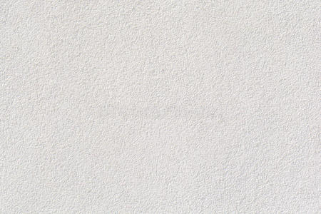 白色的水泥墙,质地石头具体的,岩石使平粉饰灰泥照片