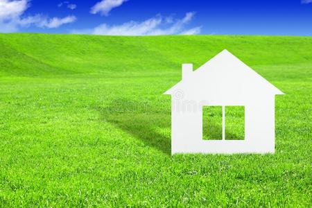 绿色的家观念,纸房屋向草照片