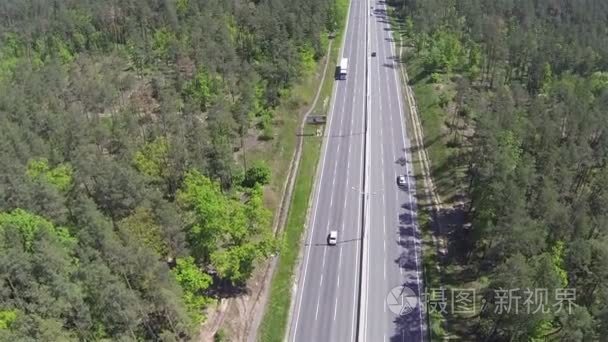 highway with cars  in sunny day. Aerial top  slow motion