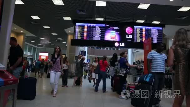 Passengers walk through Airport