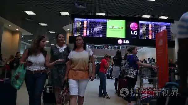 Passengers walk through Airport