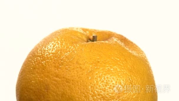 Ripe orange isolated on white  close up  rotation