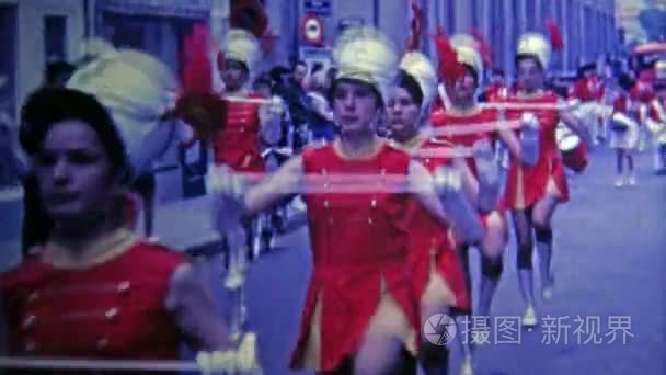 French red marching band parade on main street