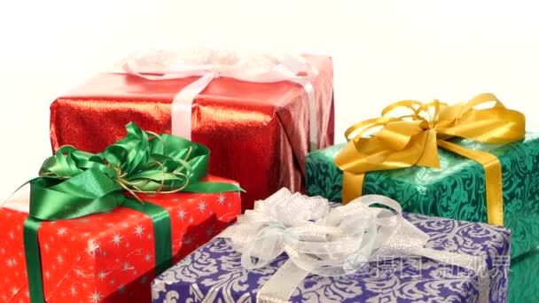 Different boxes  gifts tied with ribbons and bows isolated on wh