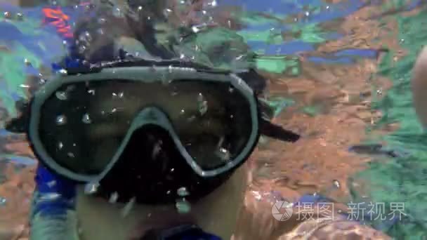 Young Man Making Underwater Selfie