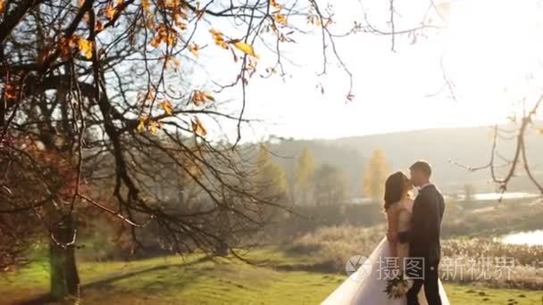 beautiful happy stylish bride with elegant groom on the backgrou