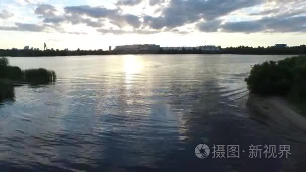 Aerial shot SUP board skiing. Dnipro River Ukraine. SunSet