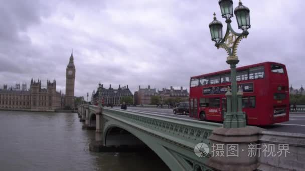 people cross Westminster Bridge in London