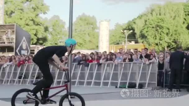 MOSCOW  RUSSIA - JUNE 6  2015: Boy make extreme jump on BMX bicy