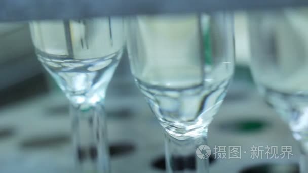 Glass flasks in medical laboratory. Closeup. Transparent chemica