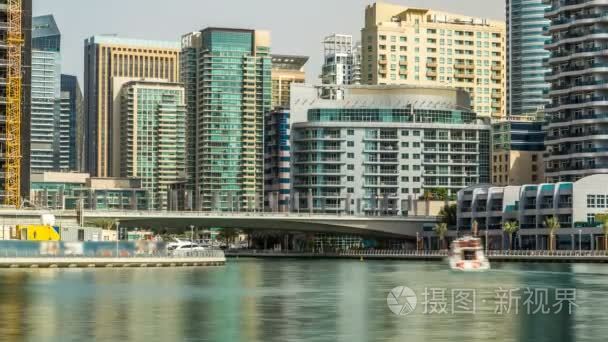 Towers and bridge in Dubai Marina timelapse, UAE.