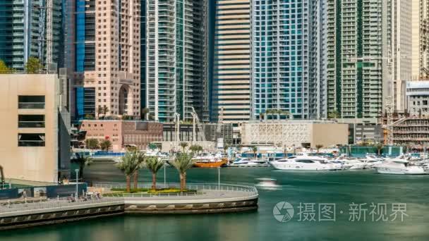 View of Dubai Marina modern Towers in Dubai at day time timelaps