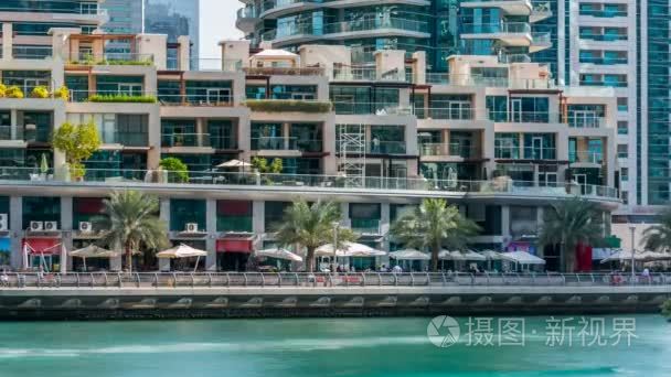 Promenade and restaurants timelapse at the Marina walk  During d