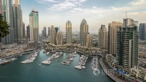 Beautiful aerial top view day to night timelapse of Dubai Marina