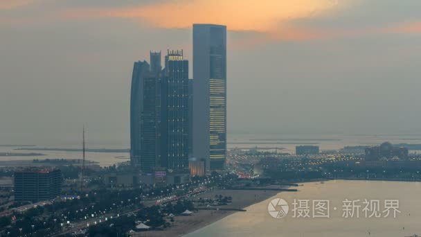 顶视图的著名塔建筑在阿布扎比天到晚上游戏中时光倒流