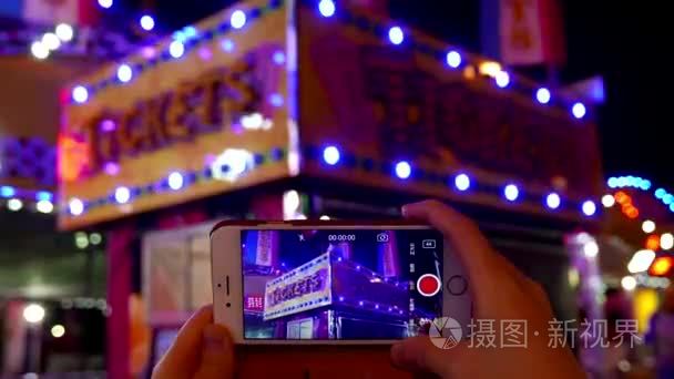 Prepare recording of ticket booth neon sign looped on smart phon