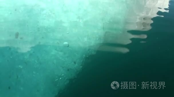 Small Iicebergs floating in sea around  Greenland.