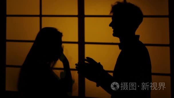 Relationship difficulties. Silhouette. Close up