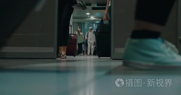 Women with Trolley Bags in the Airport