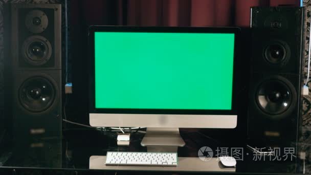 Chroma key. Stylish workspace with computer green screen and aud