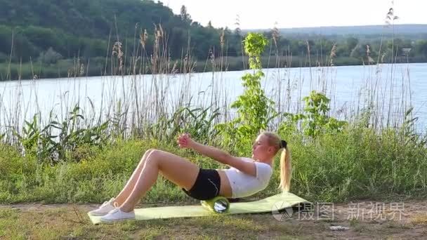 a Shot of an Athlete Doing SitUps Outside