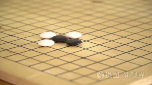 中国走在木板上玩的游戏围棋视频