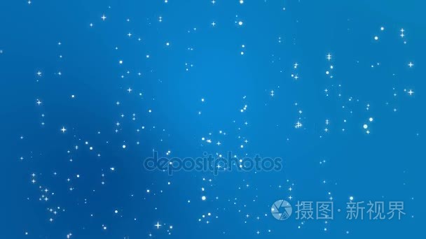 明星轻粒子落在蓝色的背景下视频