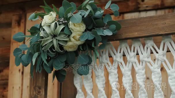 婚礼拱门装饰的木制背景上花边视频