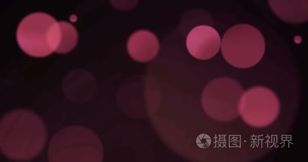 紫色紫色抽象泡沫颗粒散景在黑色背景下，事件节日快乐新年假期