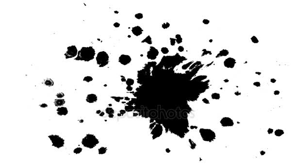 黑色墨水滴在干燥的纸上