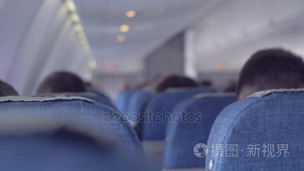 内政部内平面与乘客的座位上。机载。坐在飞机的乘客。旅行的人