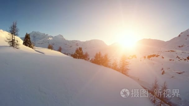 雪冬天鸟瞰日落黄昏自然景观视频