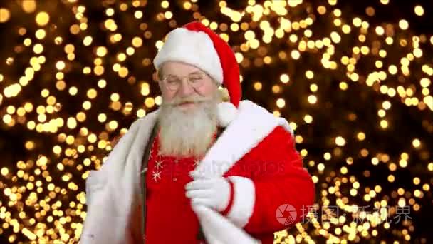 欢快的圣诞老人在灯光背景视频