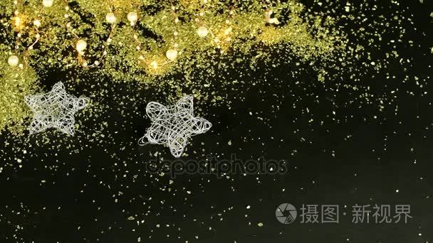 圣诞背景。银色的星星  金色的薄片和 ligths。4k