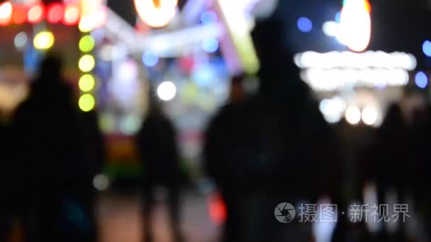 夜人公园娱乐街背景模糊视频