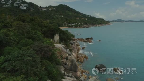 潮汐海滩石头蓝色海洋海湾自然泰国海岸棕榈岩视频