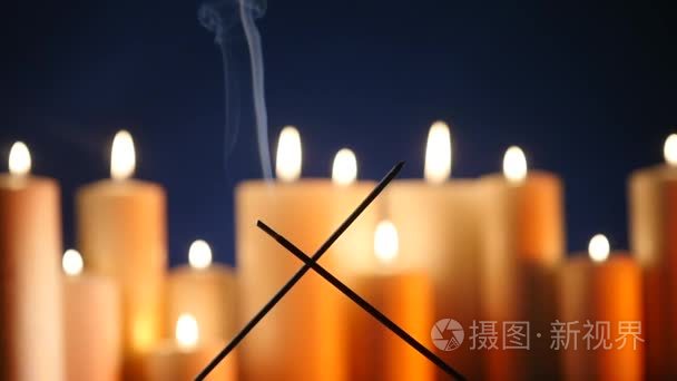 芳香棒在发炎蜡烛背景下的炎症视频