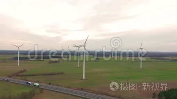 风车风力发电技术.风力发电、涡轮、风车、能源生产的空中无人机视图.绿色