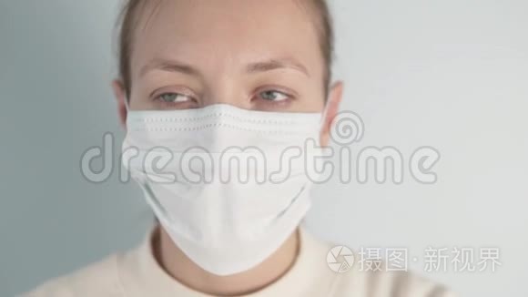 一个带病毒的戴防护口罩的女人视频