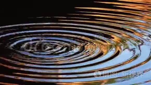 水滴和波浪在湖水上