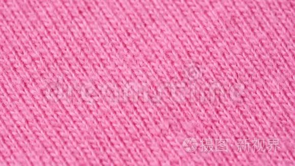 纺织背景粉红色100棉布与运动衫支架结构。