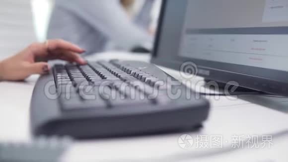 商务、人员、技术和编程概念-办公室电脑键盘上的近距离打字