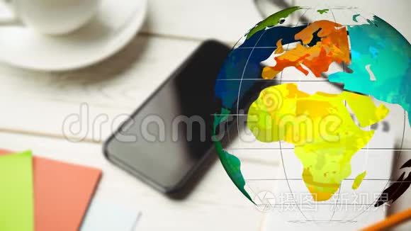 彩色地球仪在手机前旋转的动画视频