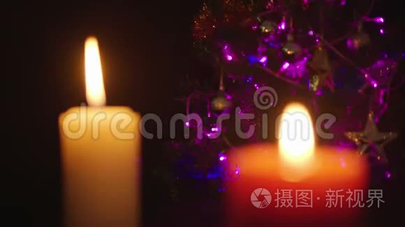 用蜡烛燃烧的镜头装饰圣诞。 圣诞节