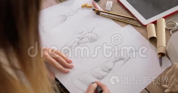 裁缝师绘制草图的作物镜头视频