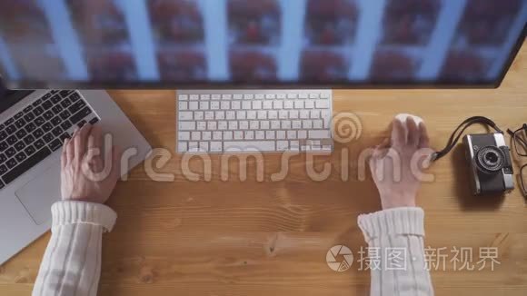 男性用手提电脑和鼠标在电脑屏幕上搜索图片