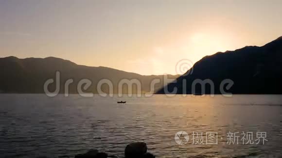 黑山的海洋和山脉日落视频