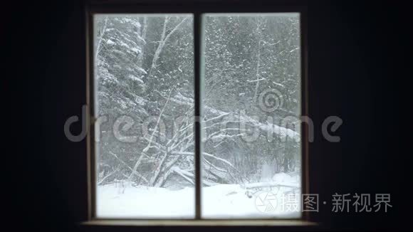 窗户旁的暴风雪景观视频