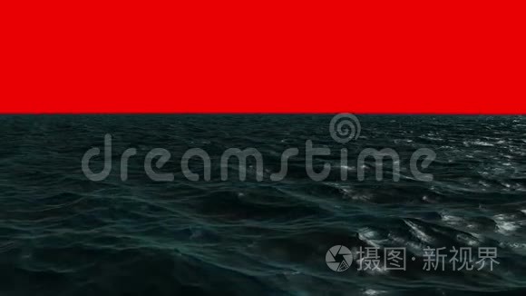 红幕天空下波涛汹涌的蓝色海洋视频